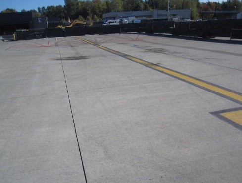 This picture shows overview photo of a PCC pavement with no distress.  The PCI of the pavement in the image is 100.